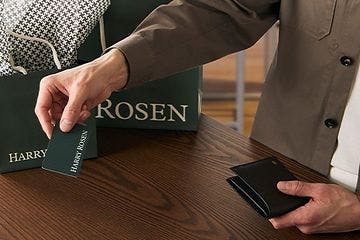 gift card message, harry rosen gift bags and male hands holding gift card and wallet over cash desk