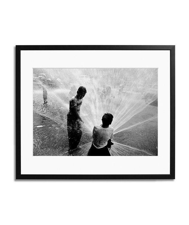 Playing With A Fire Hydrant Framed Print picture 1